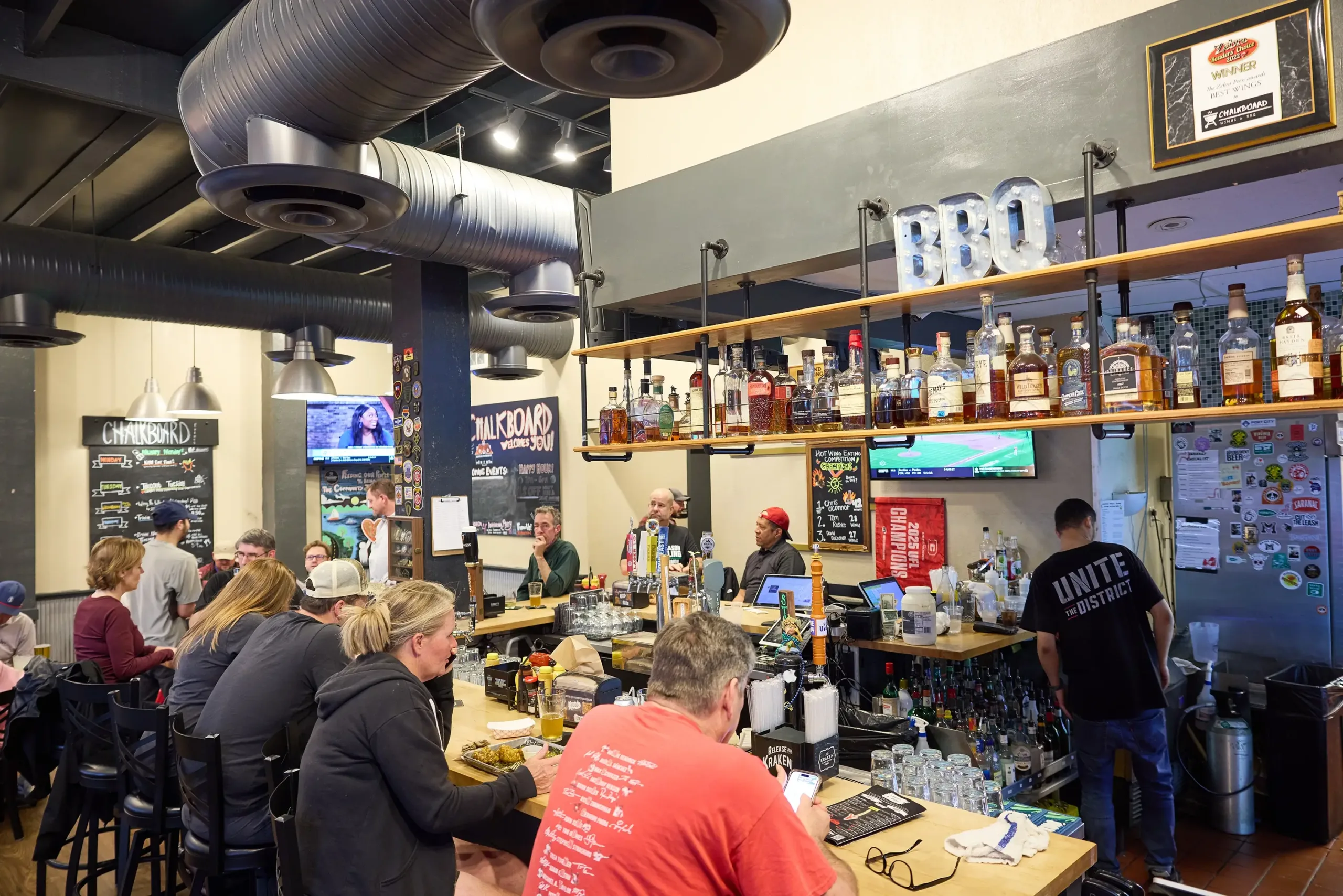 A group of people at a bar